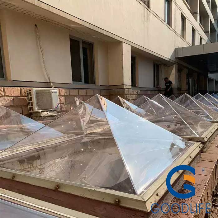 Transparent thermoformed pyramid skylight from GOODLIFE solid polycarbonate sheet demonstrating 90% light transmission capability